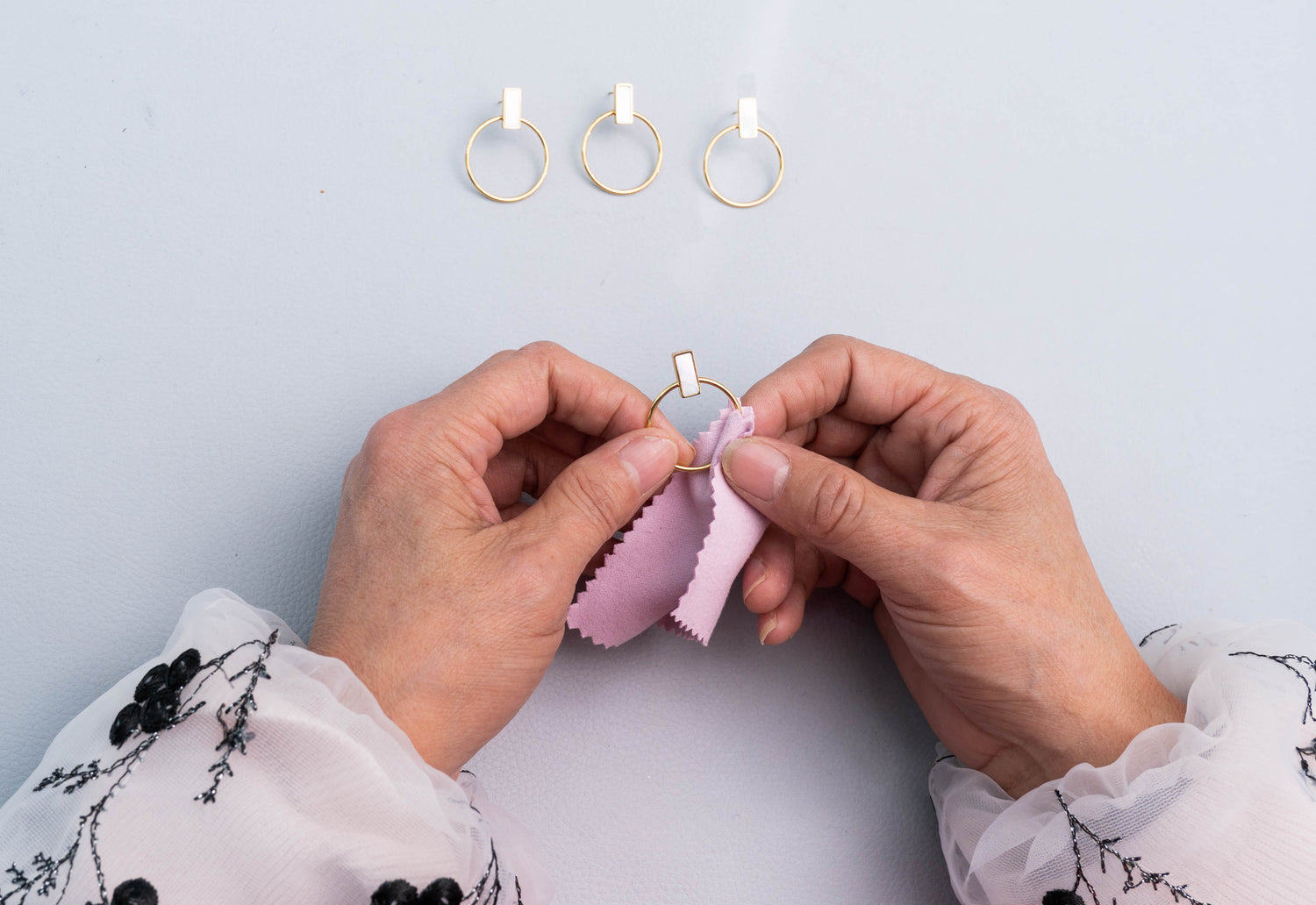 Polishing of handmade earrings from ethically sourced materials. 