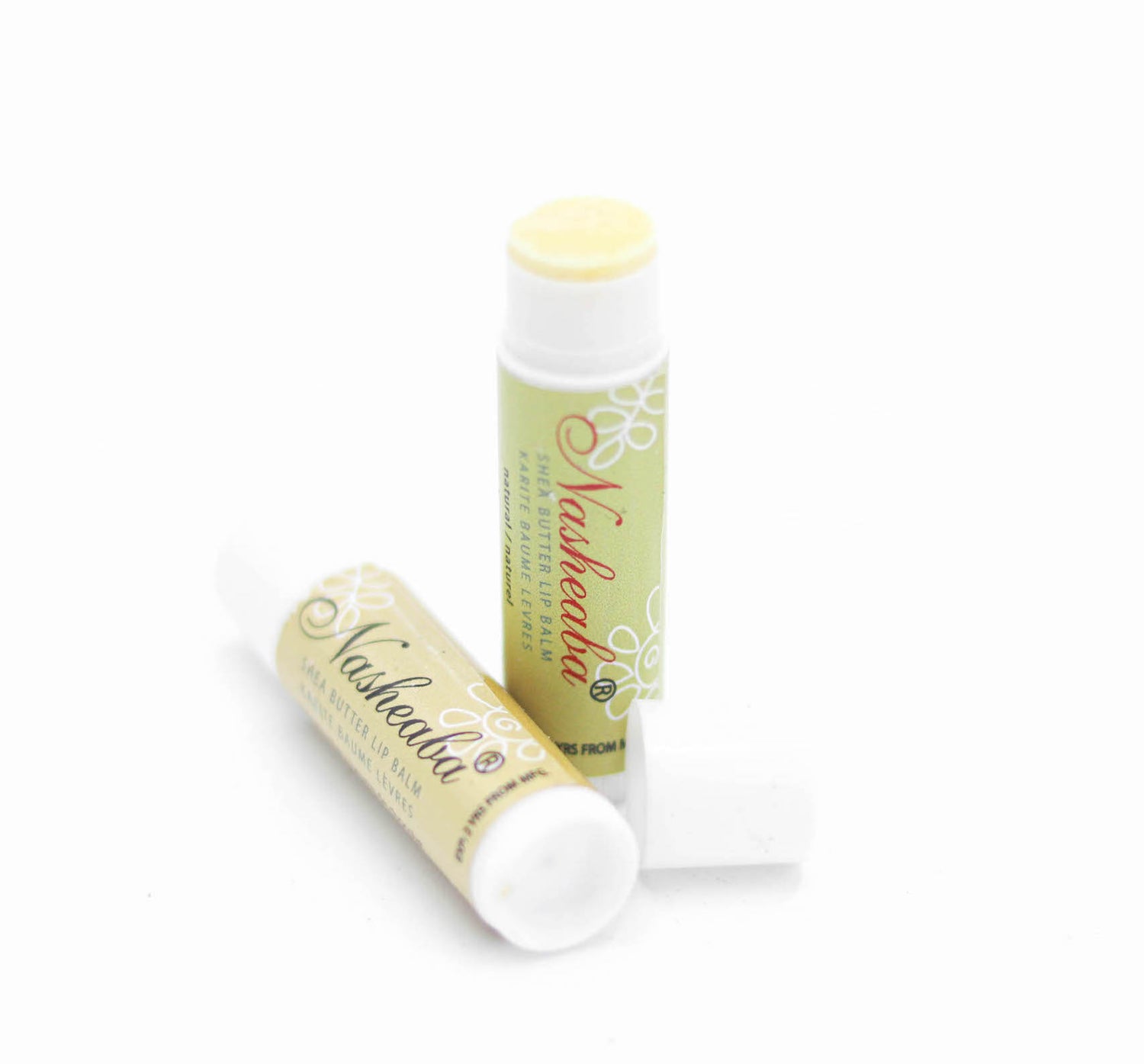 Two chapsticks made form ethically sourced shea butter. One with a lid and one without. 